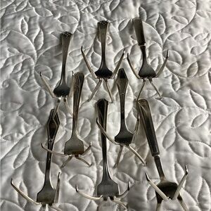 8 silverplated Vintage Forks made to hold cards to identify menu items.